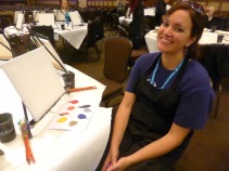 Andrea with canvas at Grand Meetup