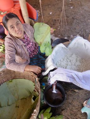 woman showing rice