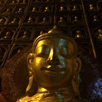 low-angle golden Buddhas